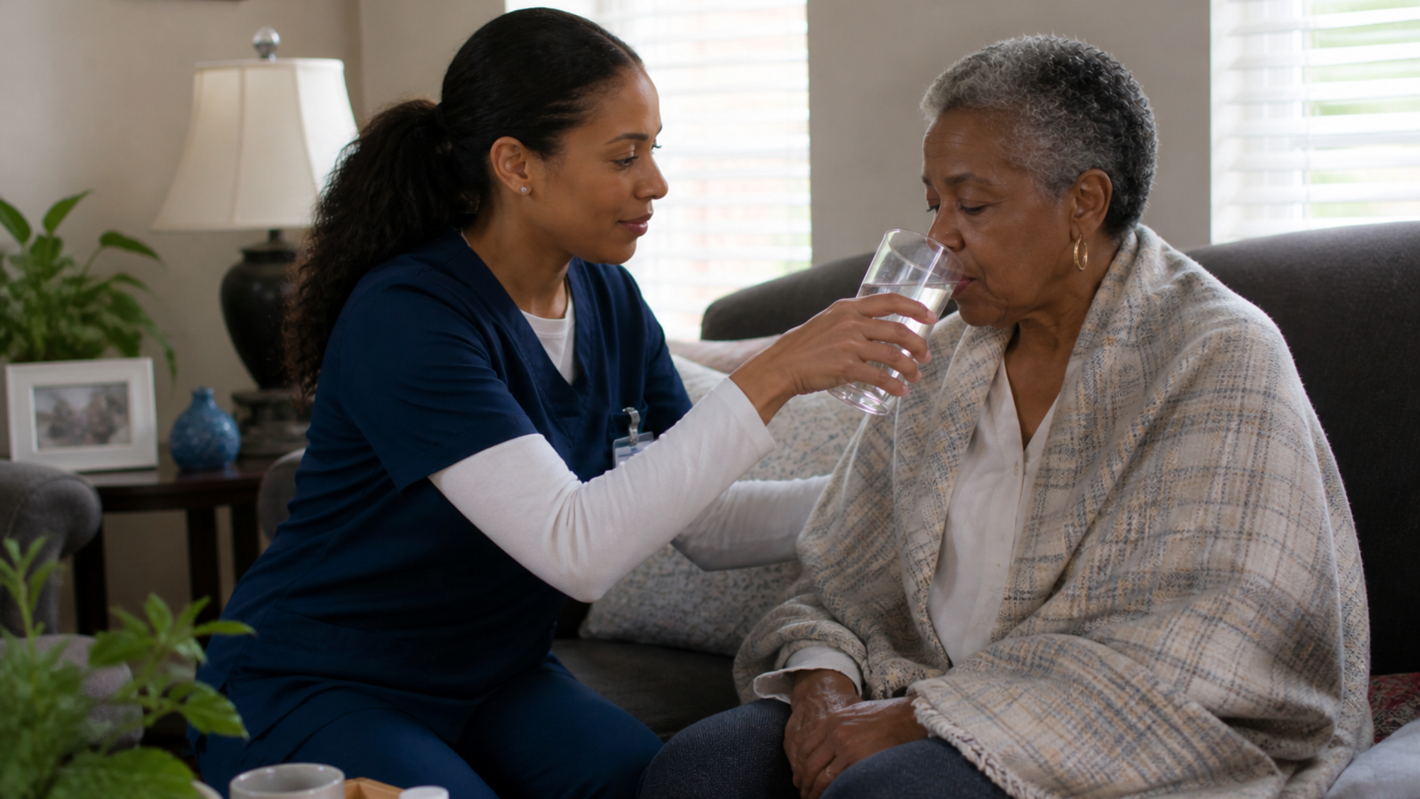 in home care maryland caregiver assisting elderly woman with daily care at home
